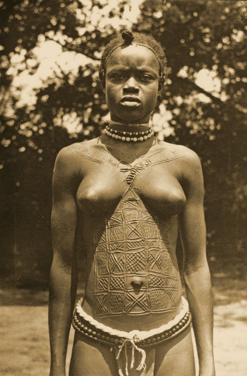 Woman from Guinea with traditional scarification, c.1905 by Unknown