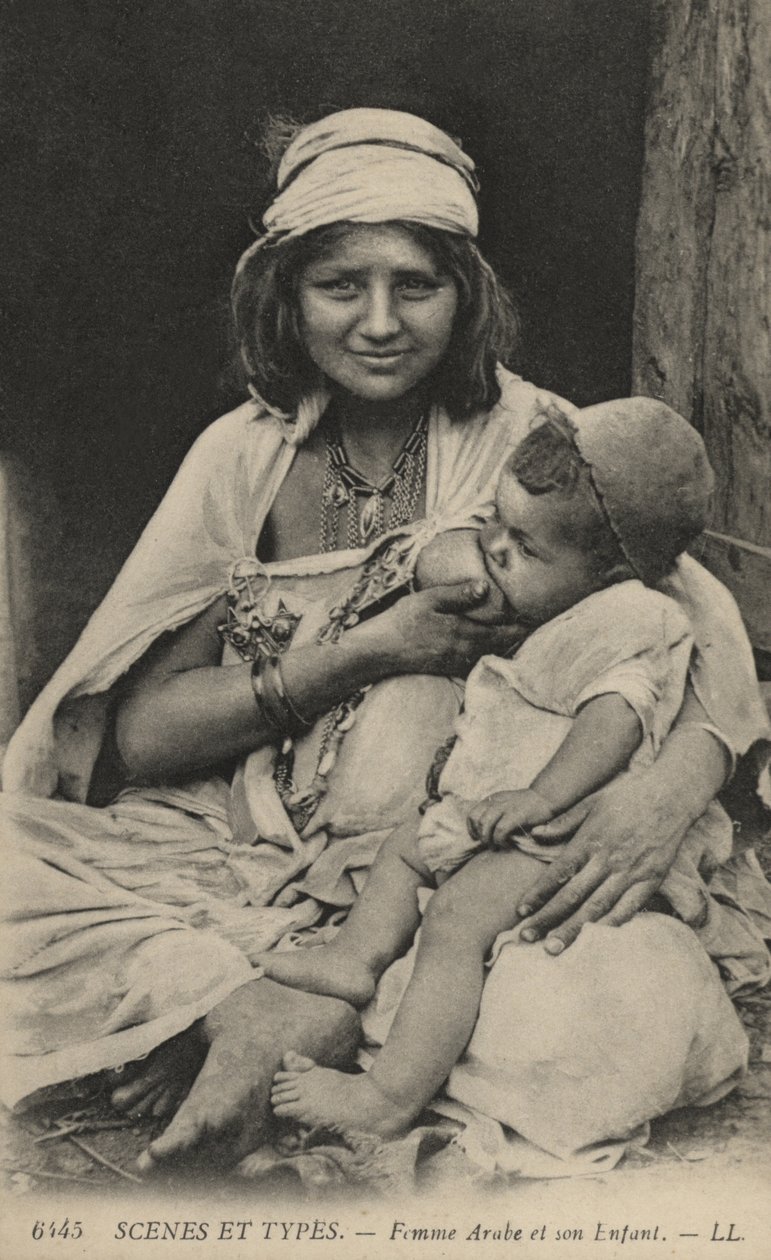 Arab Woman Feeding Her Baby by French Photographer