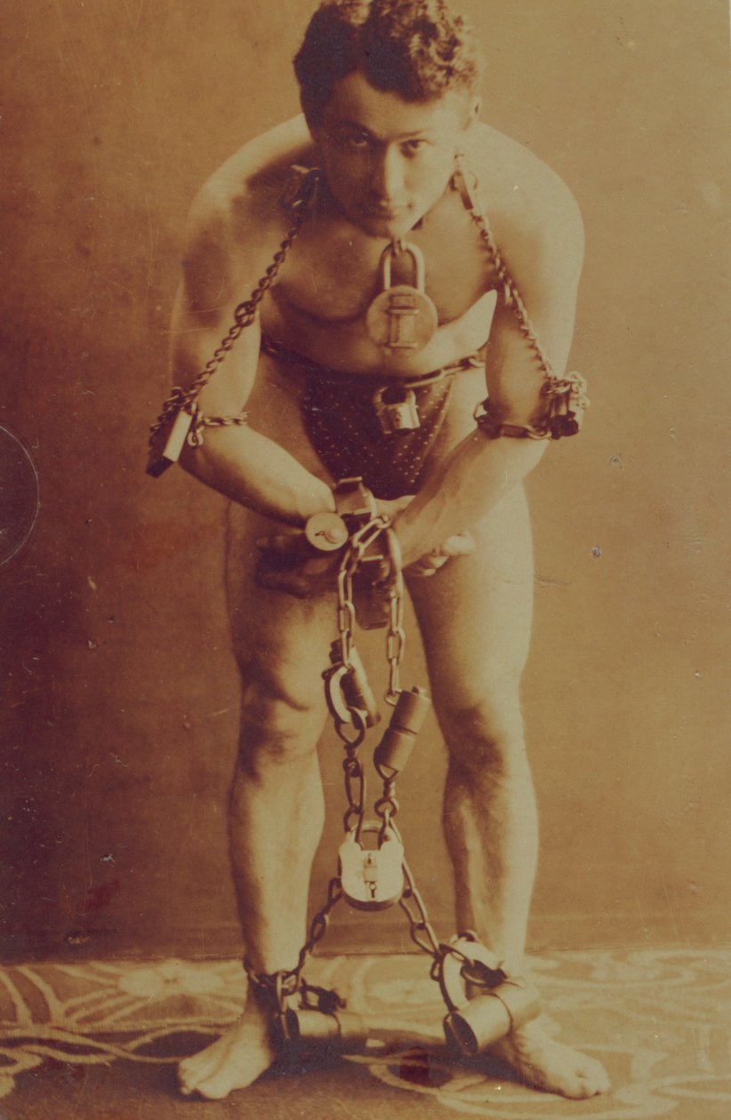 Harry Houdini in chains, c.1899 by American Photographer