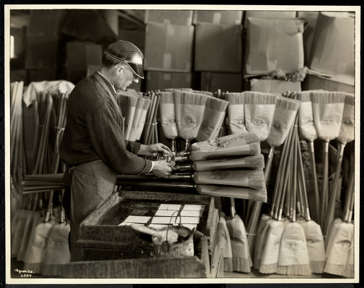 Blind Man Labeling Brooms at the Bourne Memorial Building, New York by Byron Company