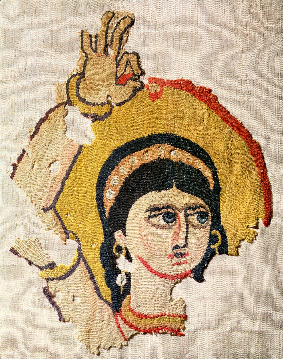 Fragment of a tapestry depicting the head of a dancer by Coptic