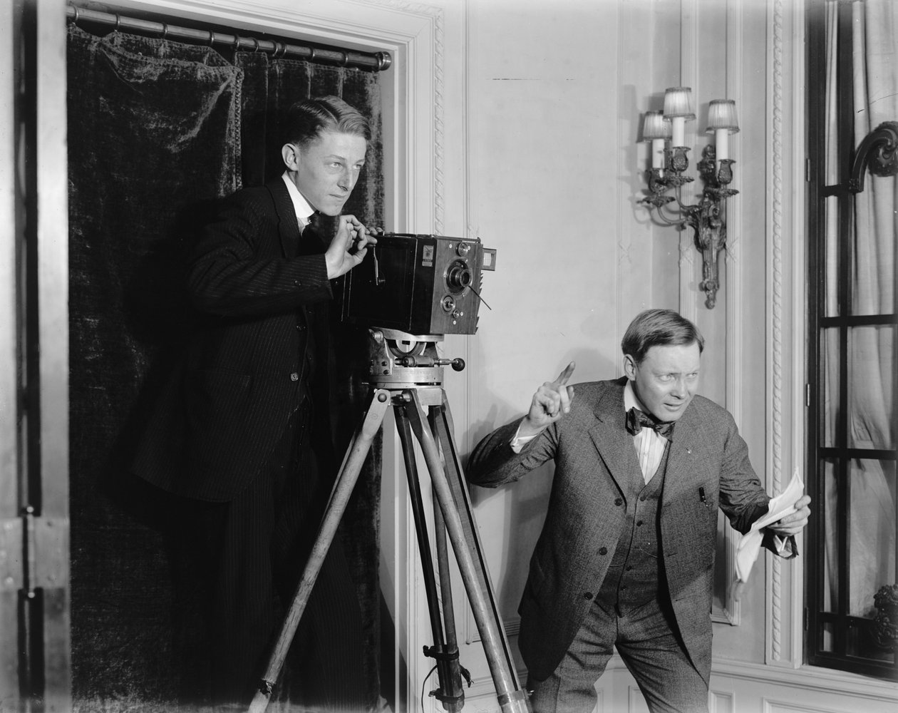 Two Men Using a Movie Camera Indoors, c.1908-20 by Detroit Publishing Co.