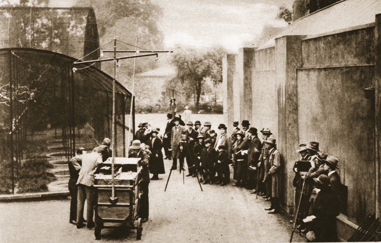 An early outside broadcast by the BBC from London Zoo as technicians attempted to record the sound of screeching from the aviary, from Wonderful London, published 1926-27 by English Photographer