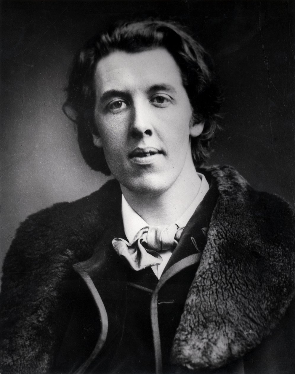 Portrait of Oscar Wilde (1854-1900) Wearing an Overcoat with a Fur Collar Bought for His Trip to America, 1881 by English Photographer