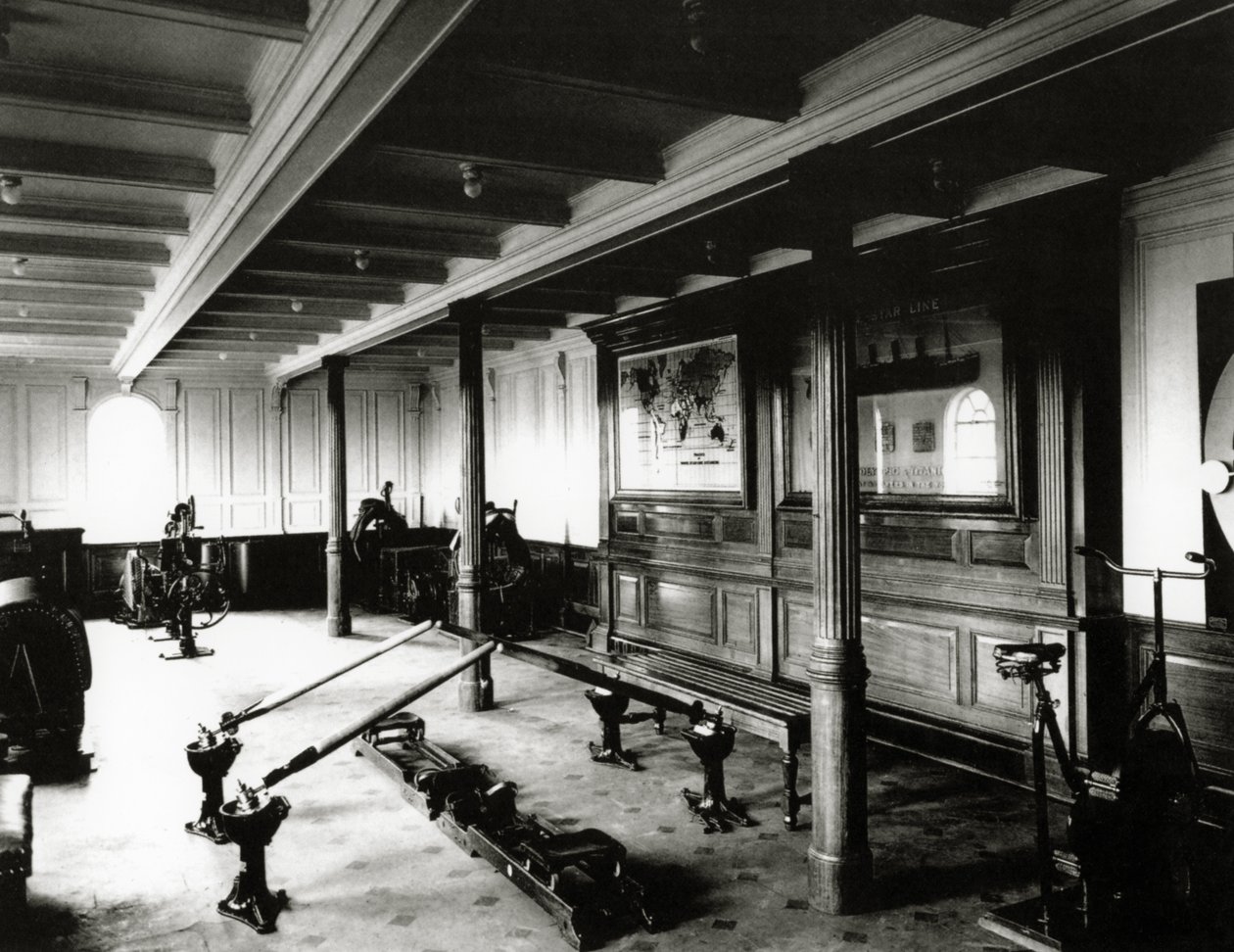 The onboard gym on the Titanic showing the rowing machines and exercise bikes, 1912 by English Photographer