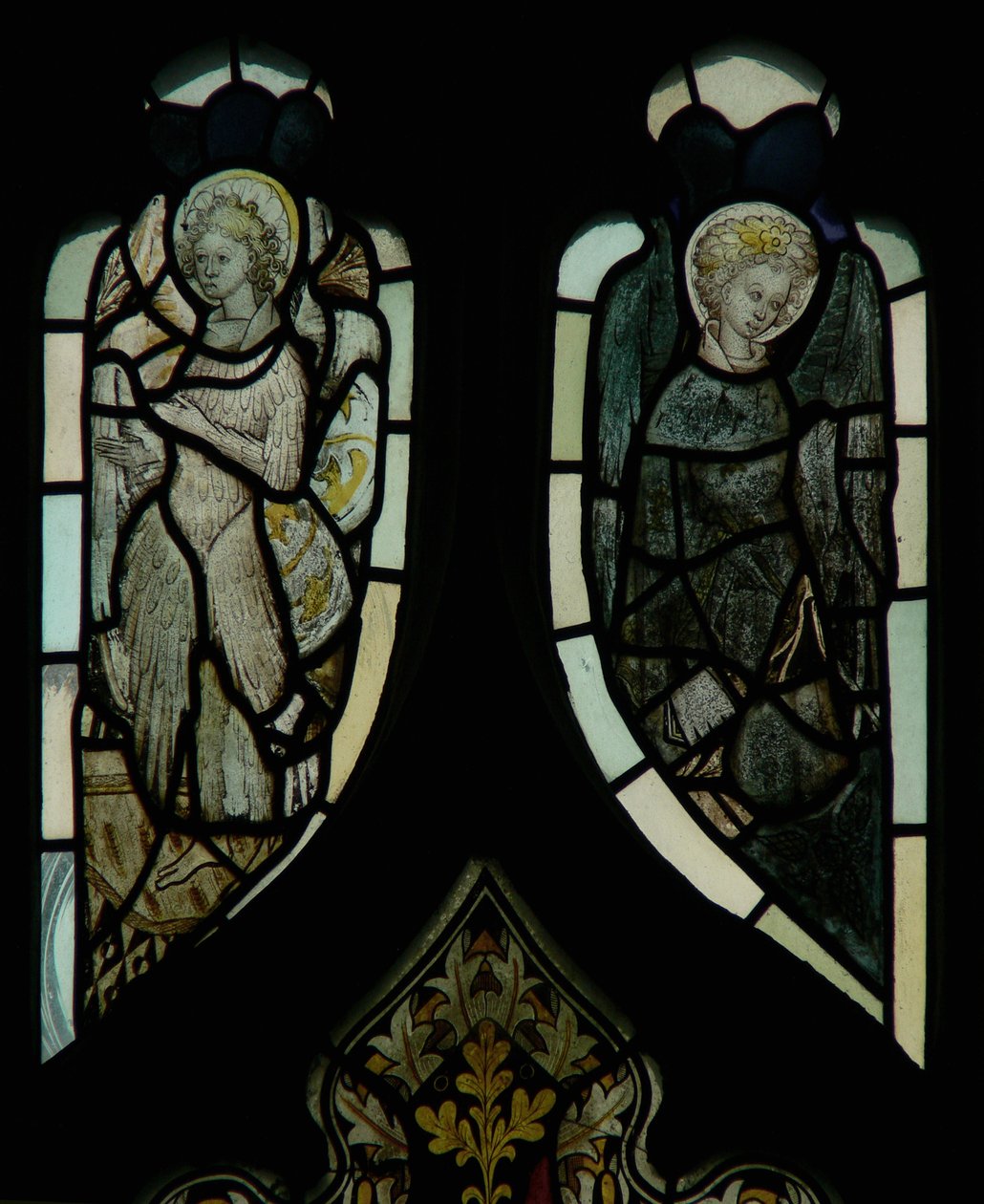 Tracery light windows depicting angels by English School