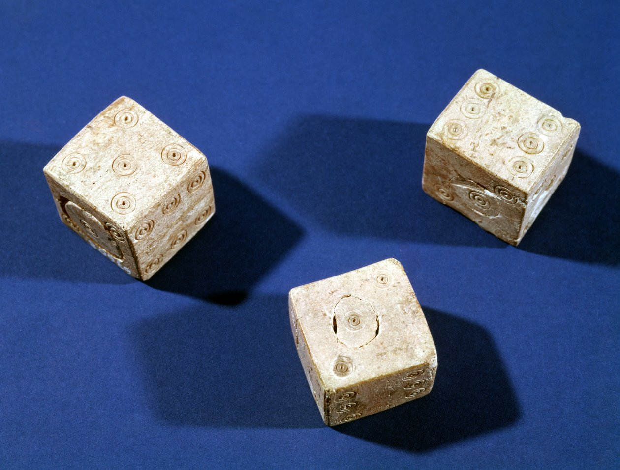 Three dice, from the acropolis at Osteria by Etruscan