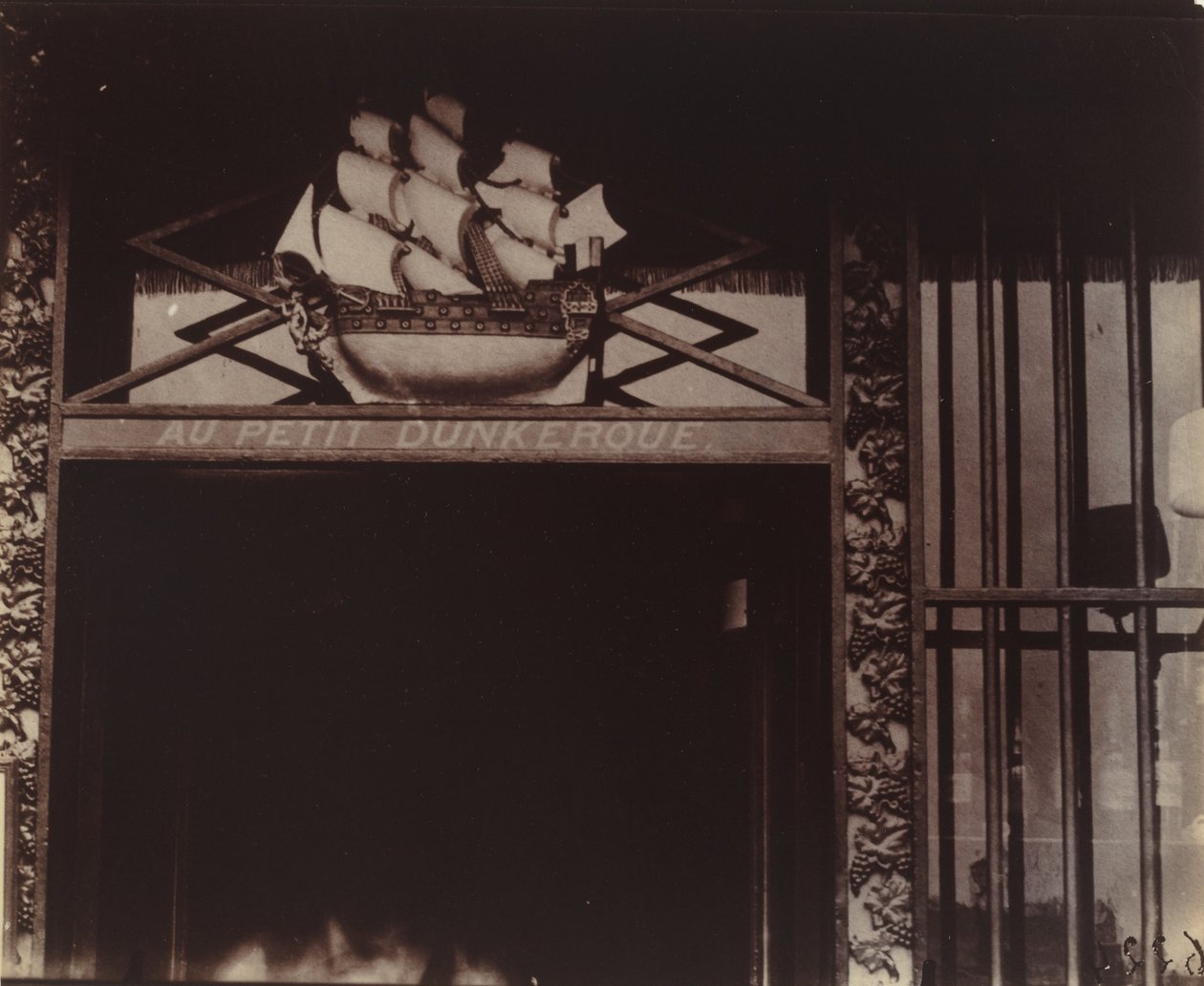 At Little Dunkirk, 3 Quai Conti by Eugène Atget