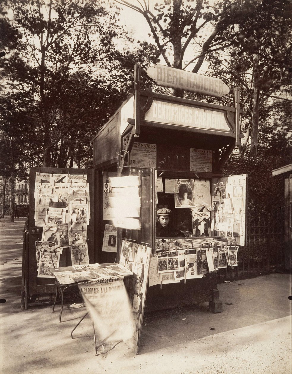 Kiosk in Paris, c.1910 by Eugène Atget
