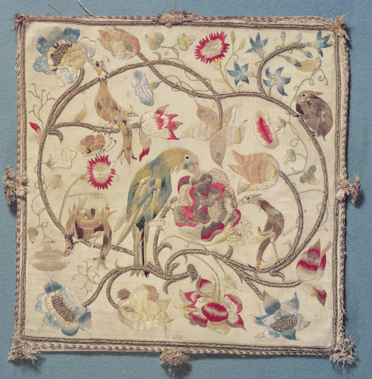 Embroidery with a design of parrots by French School