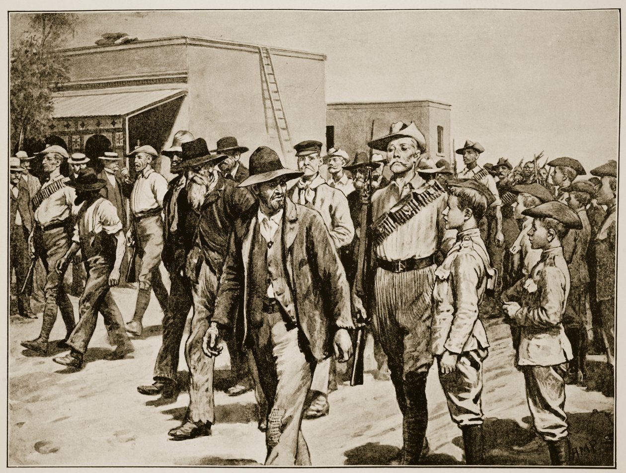 The last attack on Mafeking: B.S.A. Police escorting Boer prisoners to the gaol, from material supplied by Major F.D. Baillie, Special Correspondent of the 