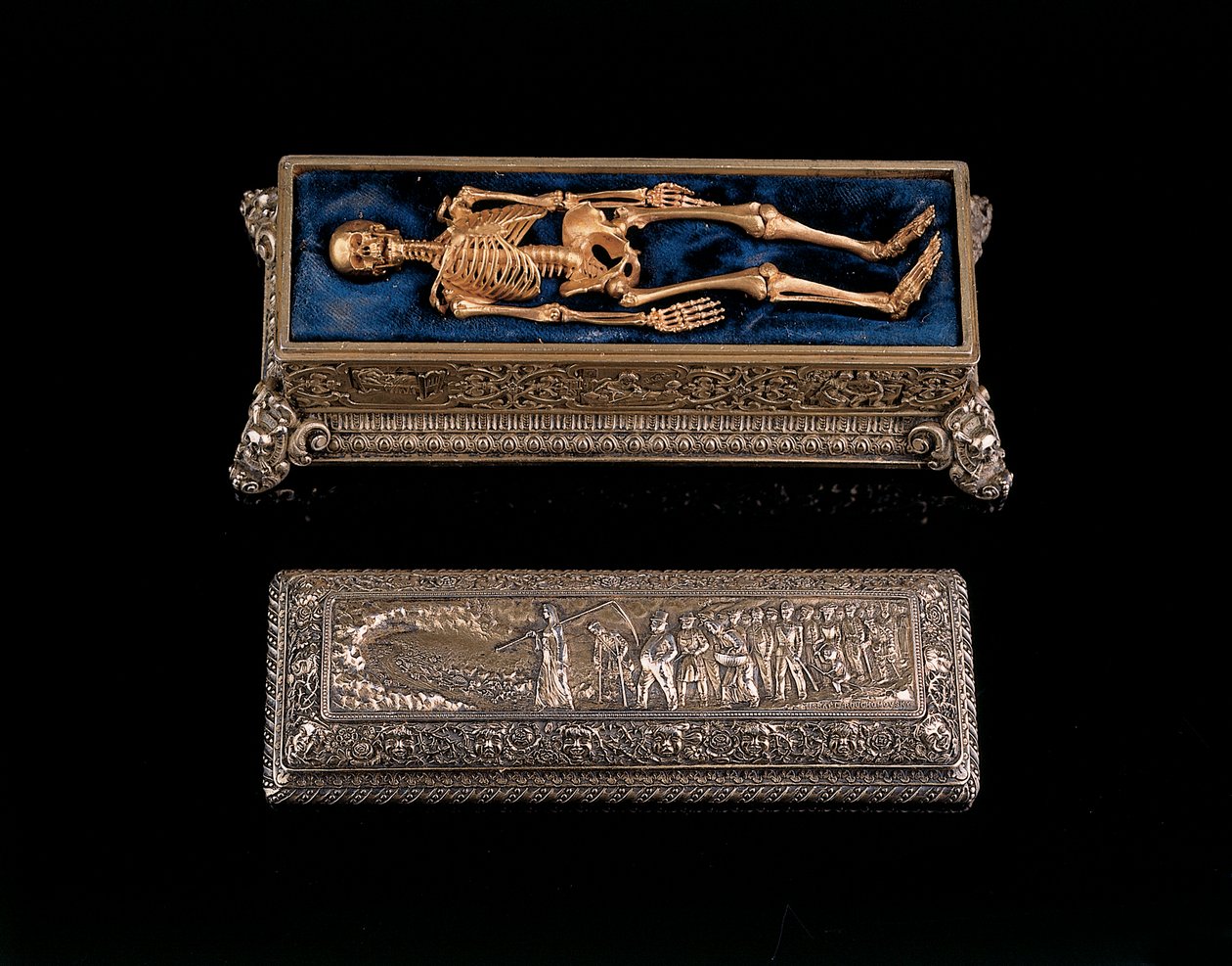 Miniature human skeleton and sarcophagus by Israel Rouchomovsky