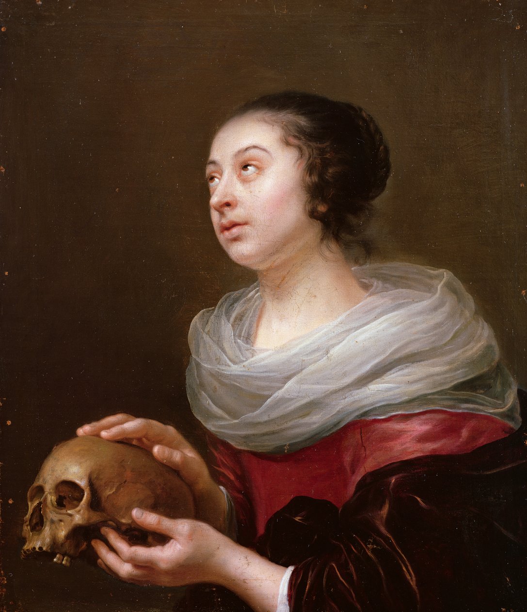 A Young Woman Holding a Skull by Jan Olis
