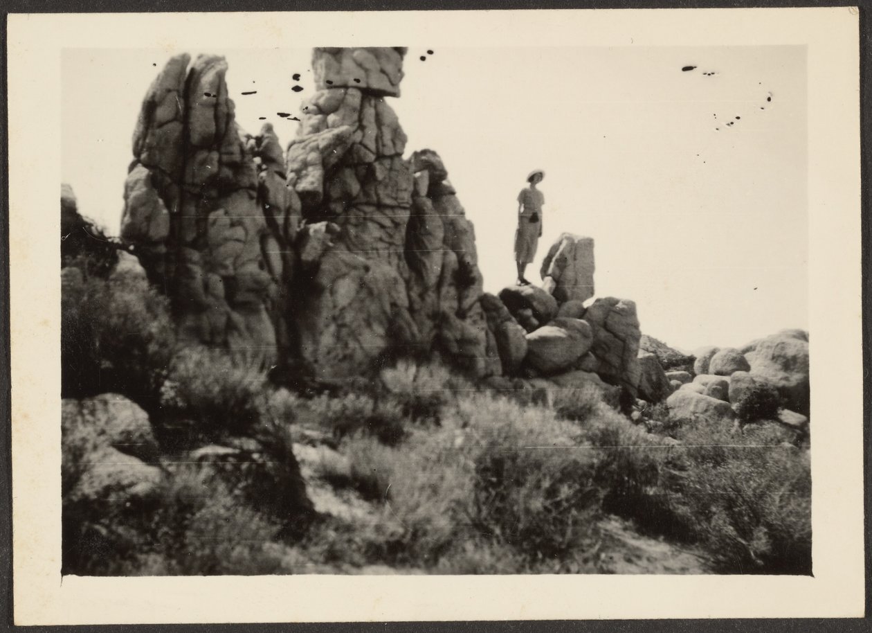 Woman Standing on Rocks by Louis Fleckenstein