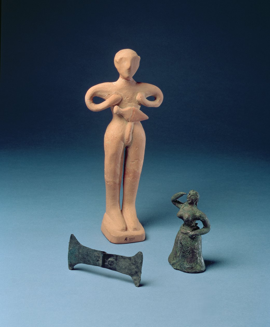 Double axehead and two figurines from Knossos, late Minoan, c.1500 BC by Minoan