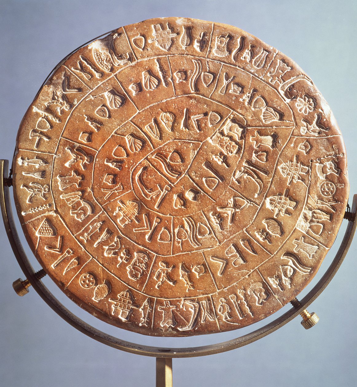 The Phaistos Disc, with symbols of unknown significance, from Crete, c.1650 BC by Minoan