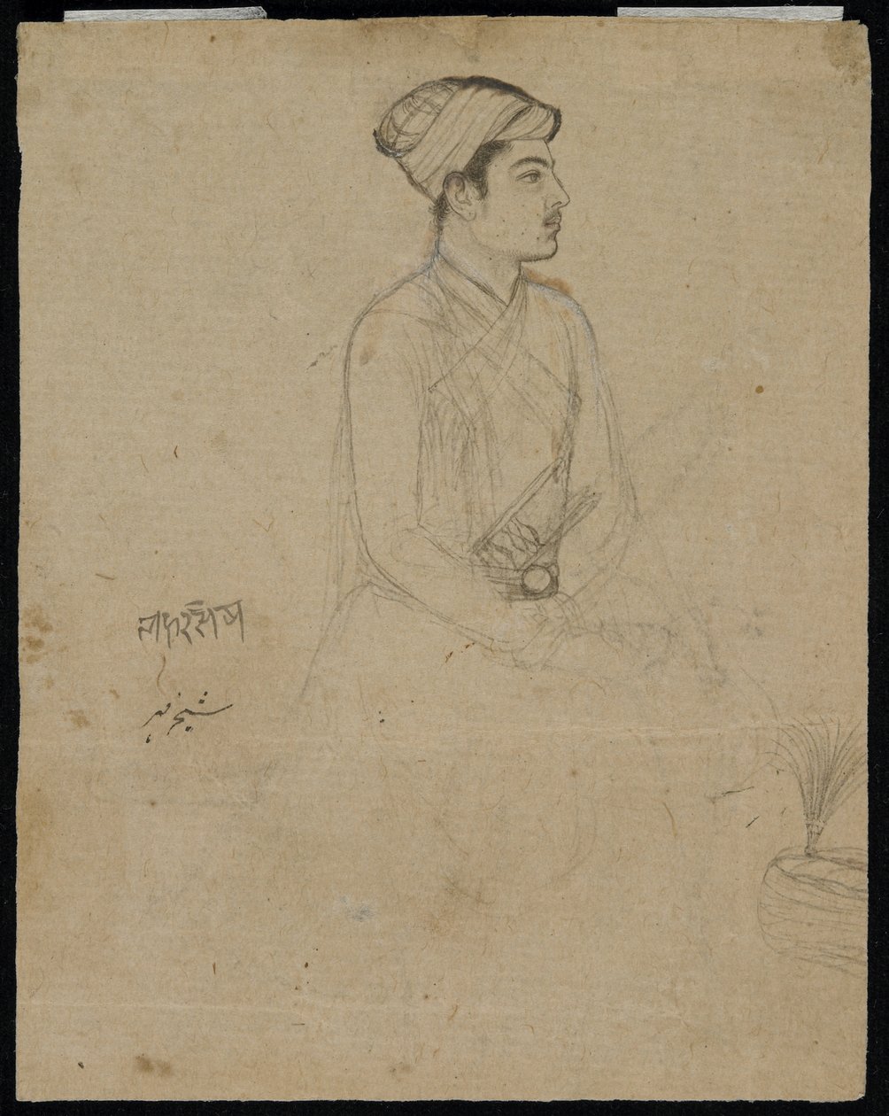 Seated nobleman by Mughal School