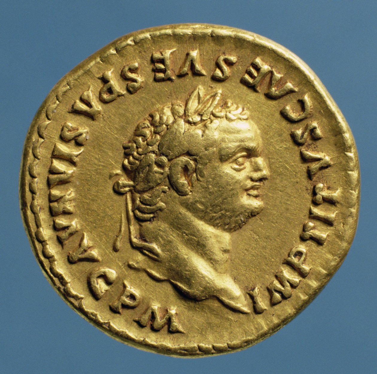 Aureus (obverse) of Titus wearing a laurel wreath by Roman