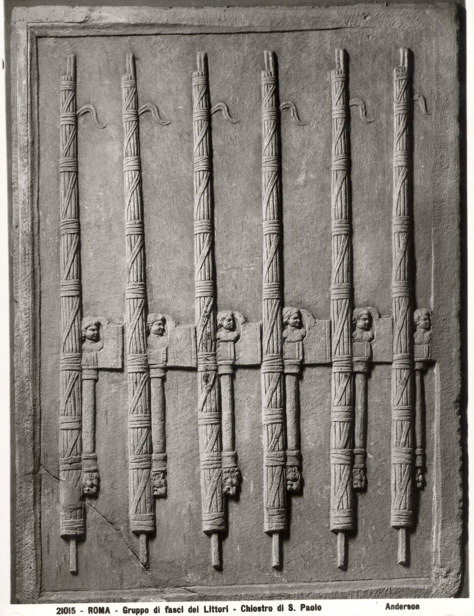 Relief depicting a group of lictors fasces by Roman Roman