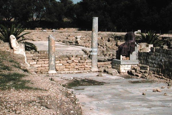 Ruins of a street with two statues by Roman