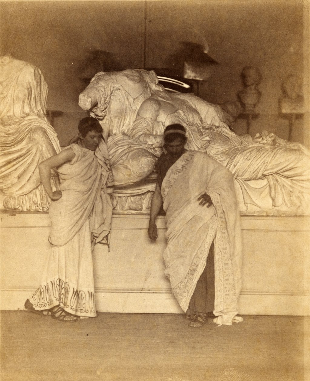 Two Male Students in Grecian Costume Before a Plaster Cast of the Three Fates from the Elgin Marbles by Thomas Eakins