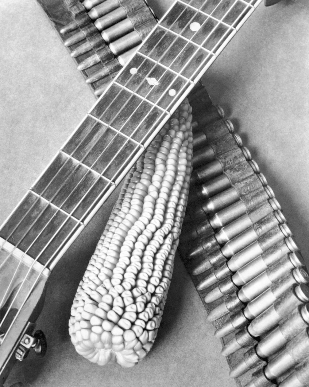 Mexican Revolution, Guitar, Corn and Ammunition Belt, Mexico City, 1927 by Tina Modotti
