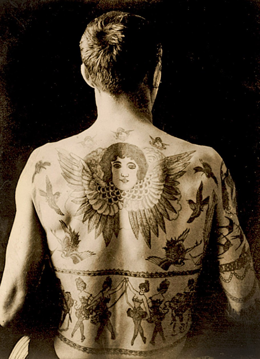 Portrait of a Man with an Elaborate Back-Piece Tattoo, c.1910 by Unbekannt Unbekannt