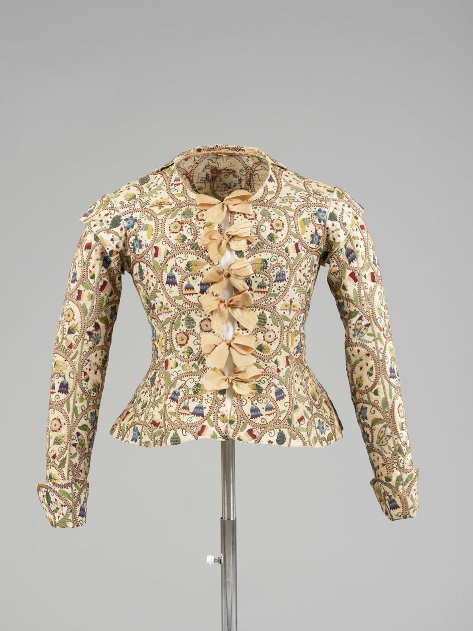 Multi-coloured silks and spangle embroidered woman
