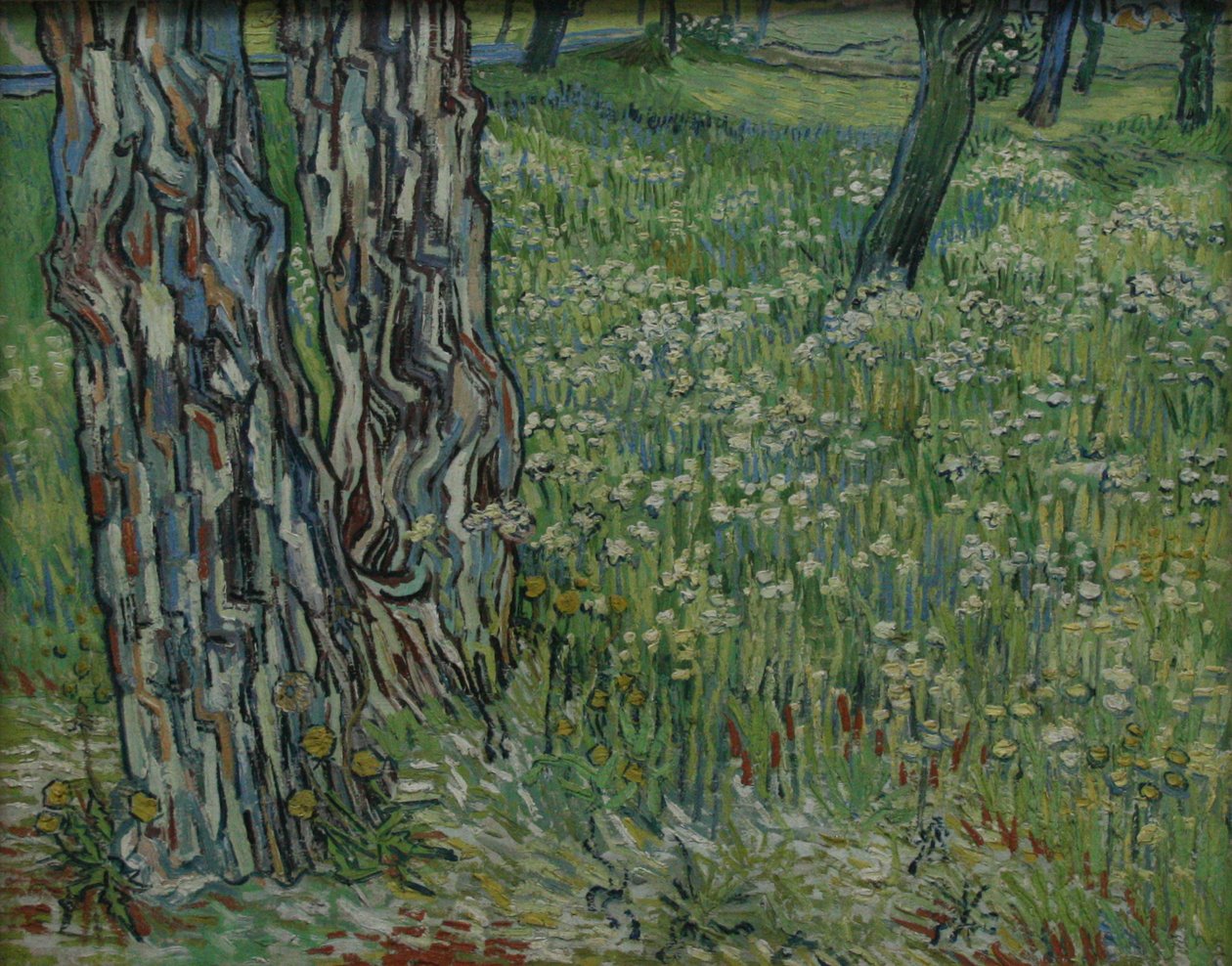 Tree Trunks in the Grass by Vincent van Gogh
