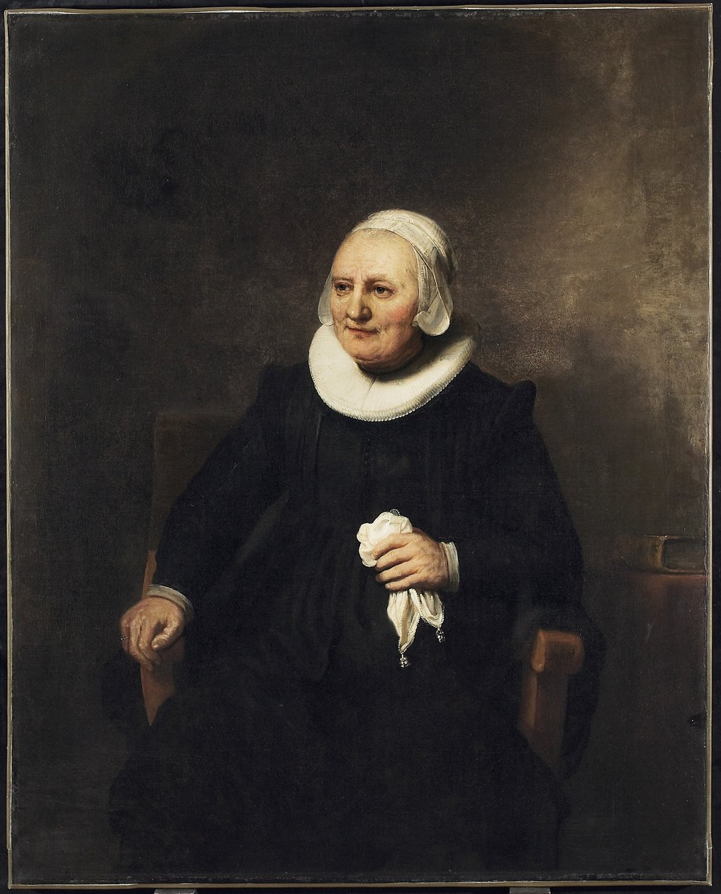 Portrait of a Seated Woman with a Handkerchief by studio of Rembrandt Harmensz. van Rijn