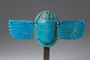 Winged scarab