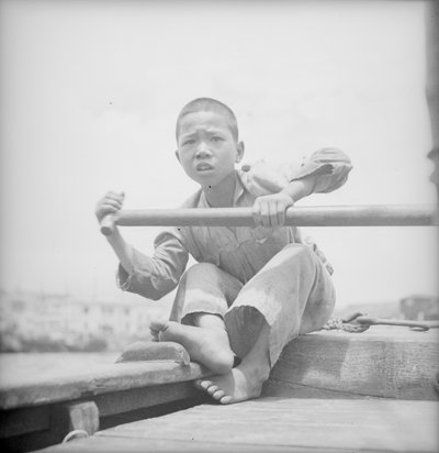 A sampan boy at Hong Kong by David Watkin Waters