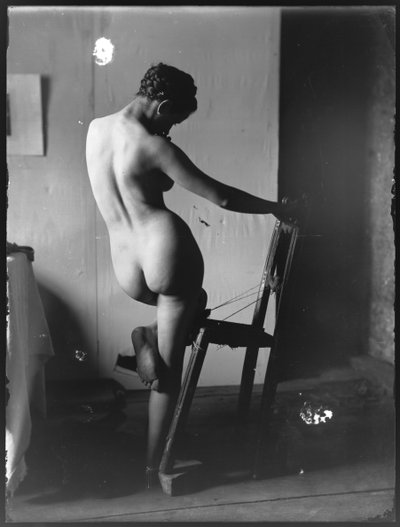 Standing Female Scene with Chair by Ferdinand Schmutzer