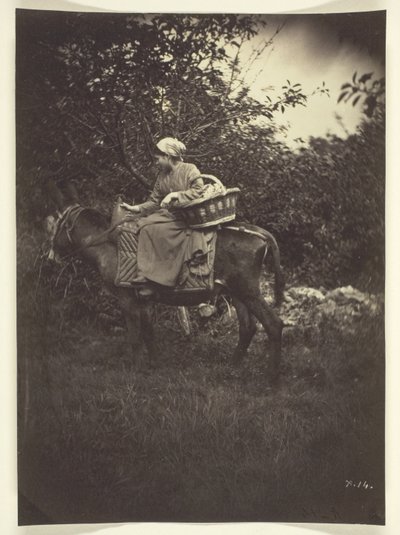 Female Peasant Riding Donkey by Giraudon
