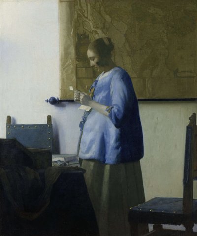 Woman in Blue Reading a Letter by Jan Vermeer van Delft