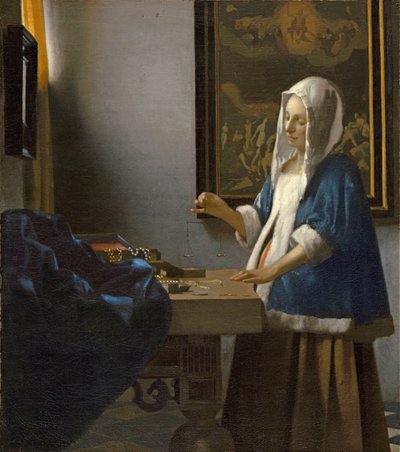 Woman Holding a Balance by Jan Vermeer van Delft