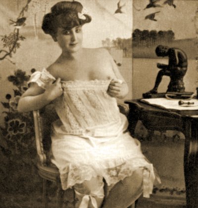 Young woman displaying a lacy chemise, c.1900 by Unknown
