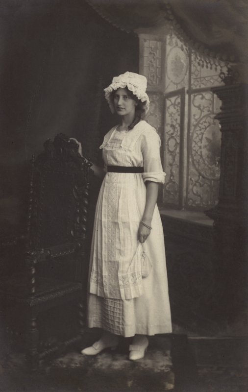 Girl in a Lace Cap by Arthur C. Burgess