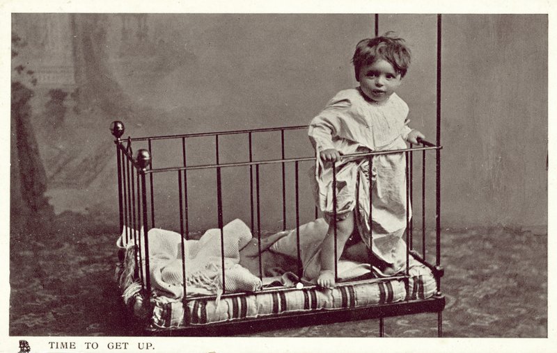 Little boy in a crib by English Photographer