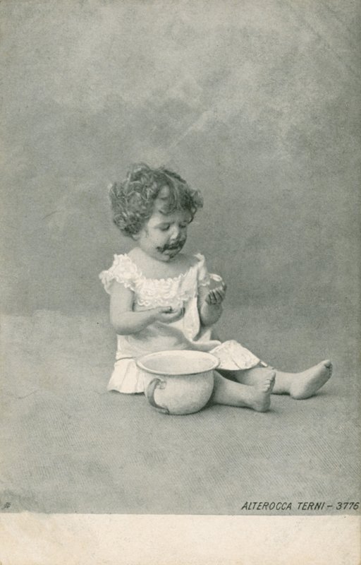 Baby playing with bubbles by Italian Photographer