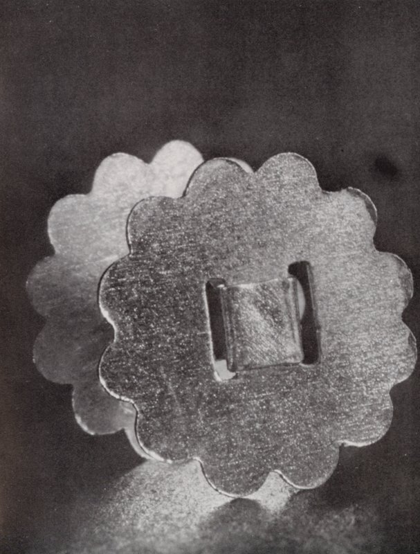 Two Paper Fasteners by Paul Henning