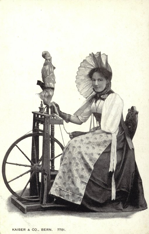 Woman Seated at a Spinning Wheel by Swiss Photographer